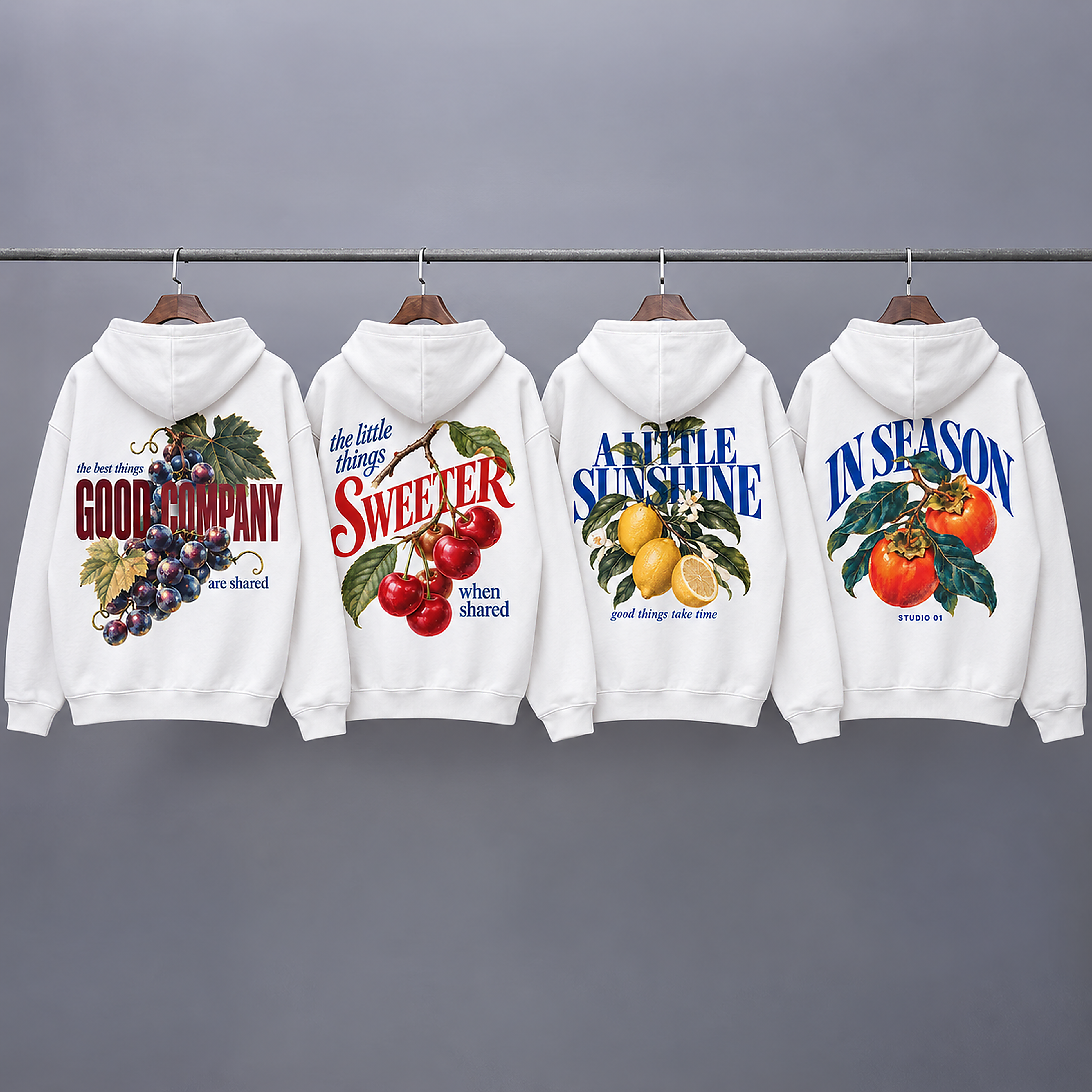 Four In Season graphic hoodies hanging on a rail